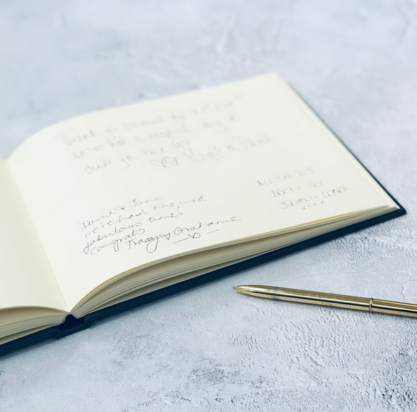
                      
                        Handwritten messages inside a guest book
                      
                    