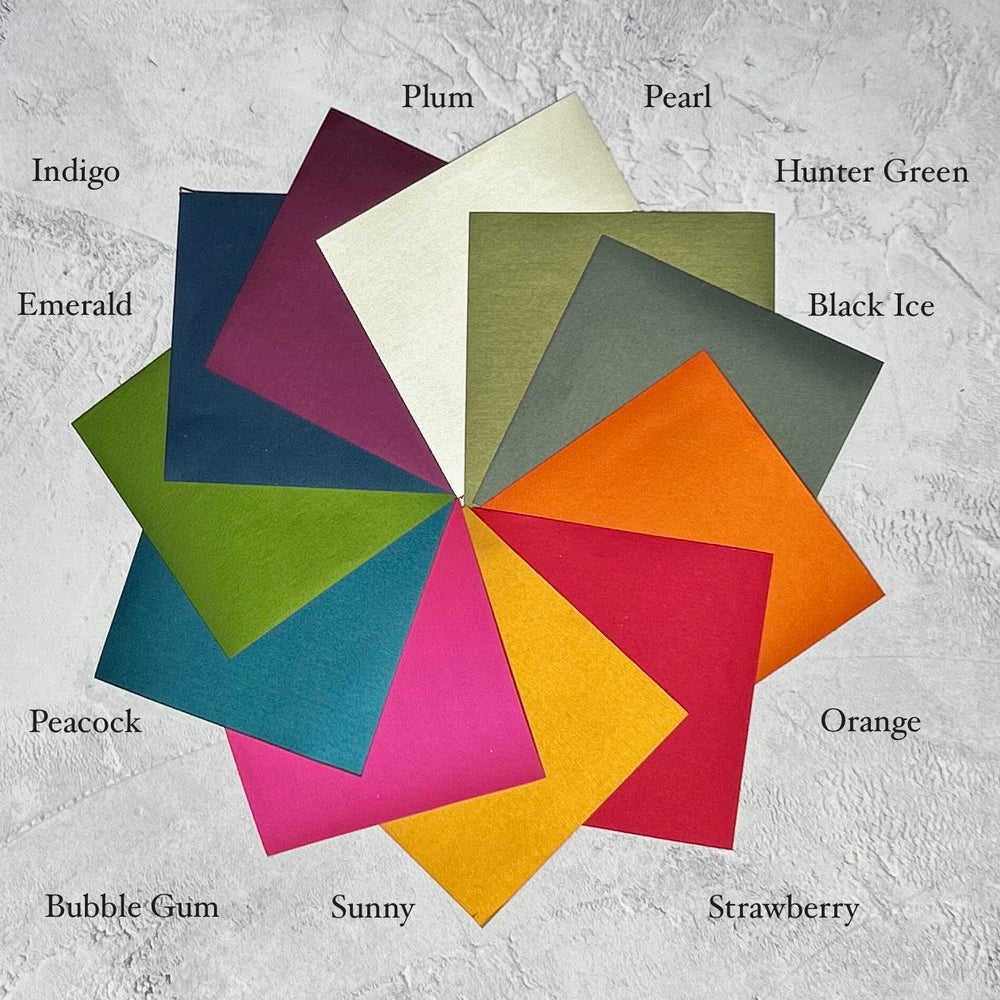 
                      
                        The colour wheel shows the eleven unique shades that the jewel collection albums are available in. Colour samples have been organised in a circle on a grey background. 
                      
                    