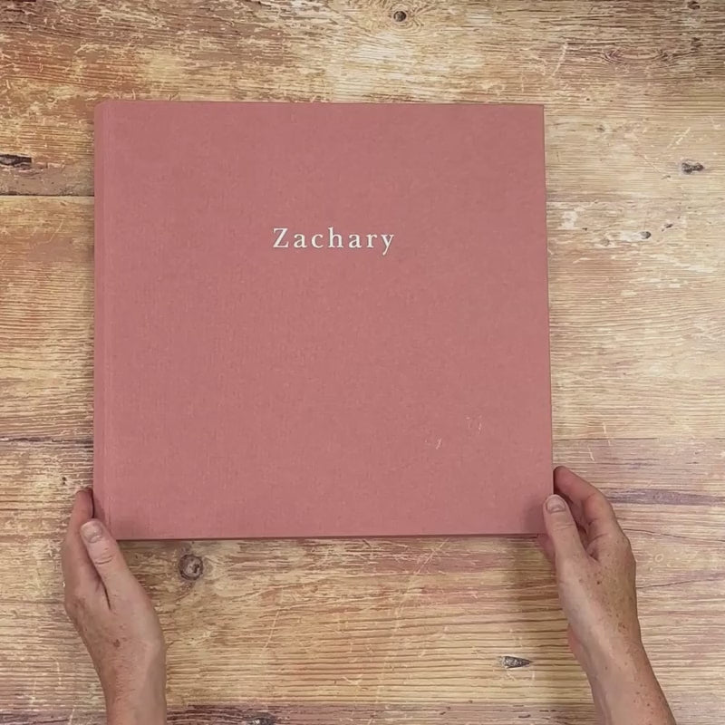 A video showing the exterior & interior of a personalised BeGolden photo album.