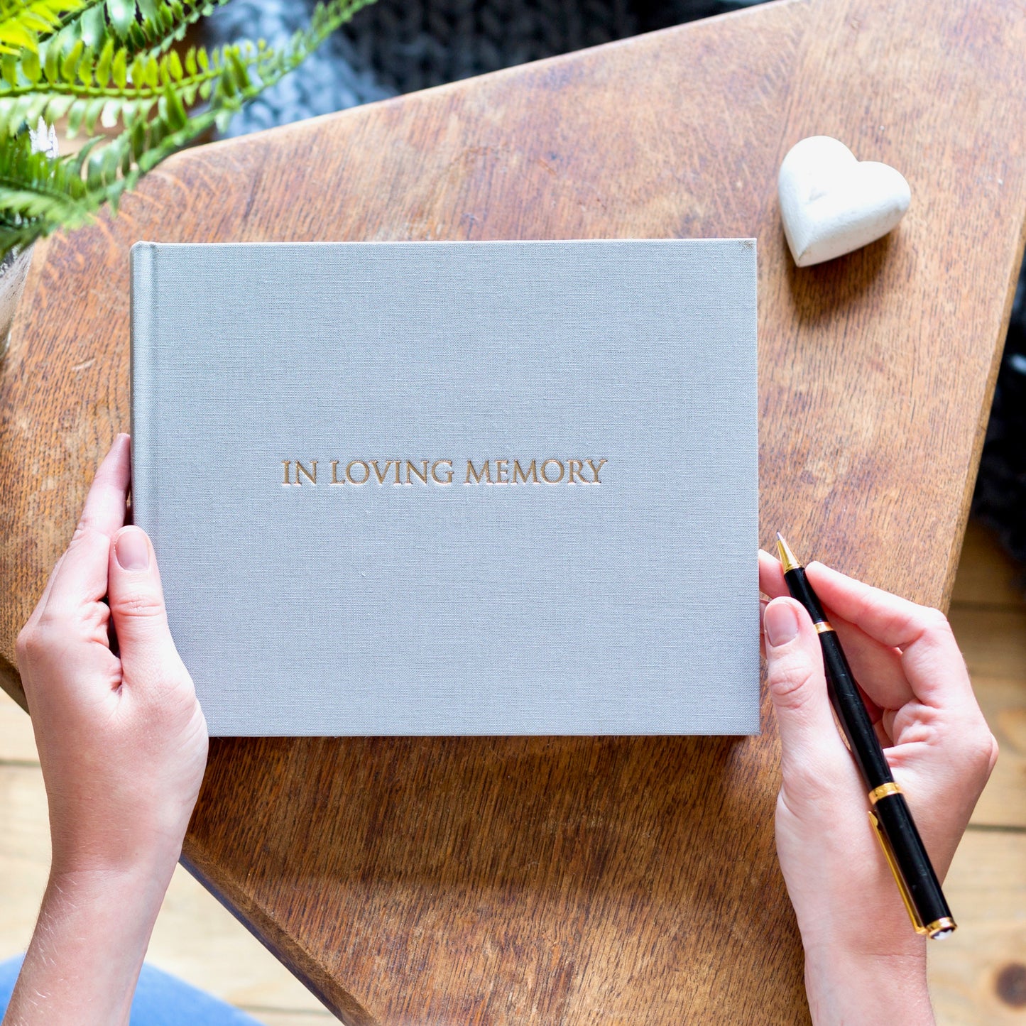 dove grey condolence book with gold embossed title