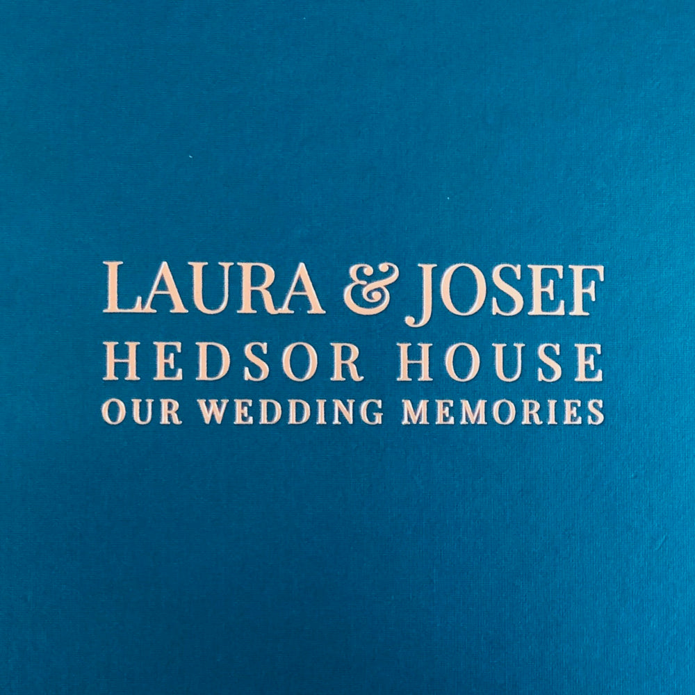 
                      
                        A close up of a personalisation on the front of the guest book
                      
                    